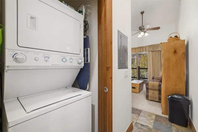 a view of bathroom with washer and dryer