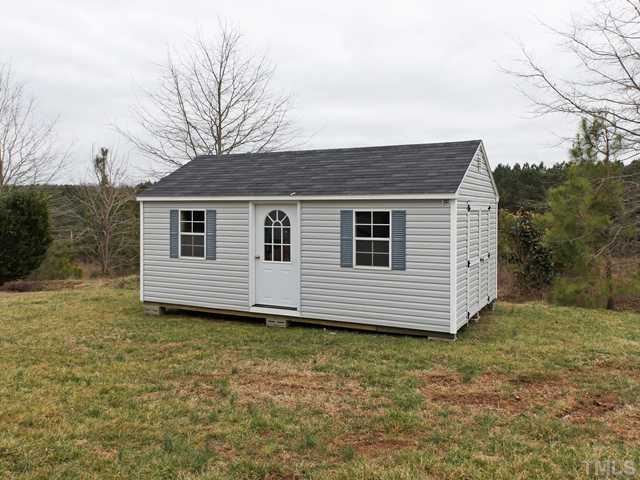 740 Rockville Road Wake Forest, NC 27587 - Photo 21 of 25 a view of a house with a yard