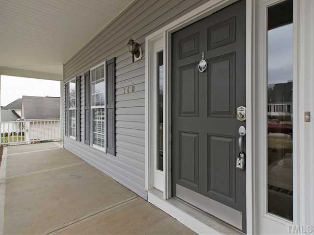 740 Rockville Road Wake Forest, NC 27587 - Photo 23 of 25 a view of a house with an outdoor space and windows