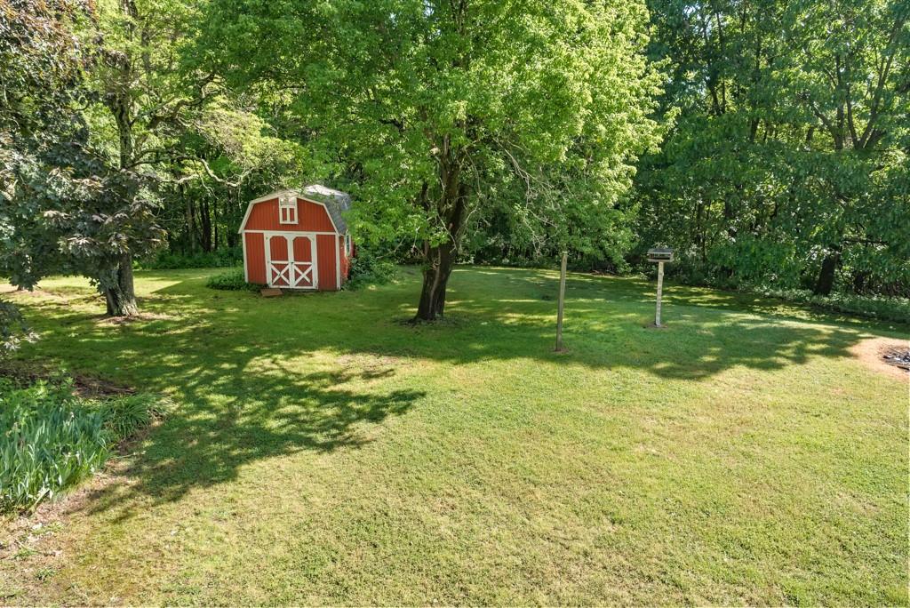2167 Butler Logan Road Tarentum, PA 15084 - Photo 3 of 25 a view of a backyard with large trees