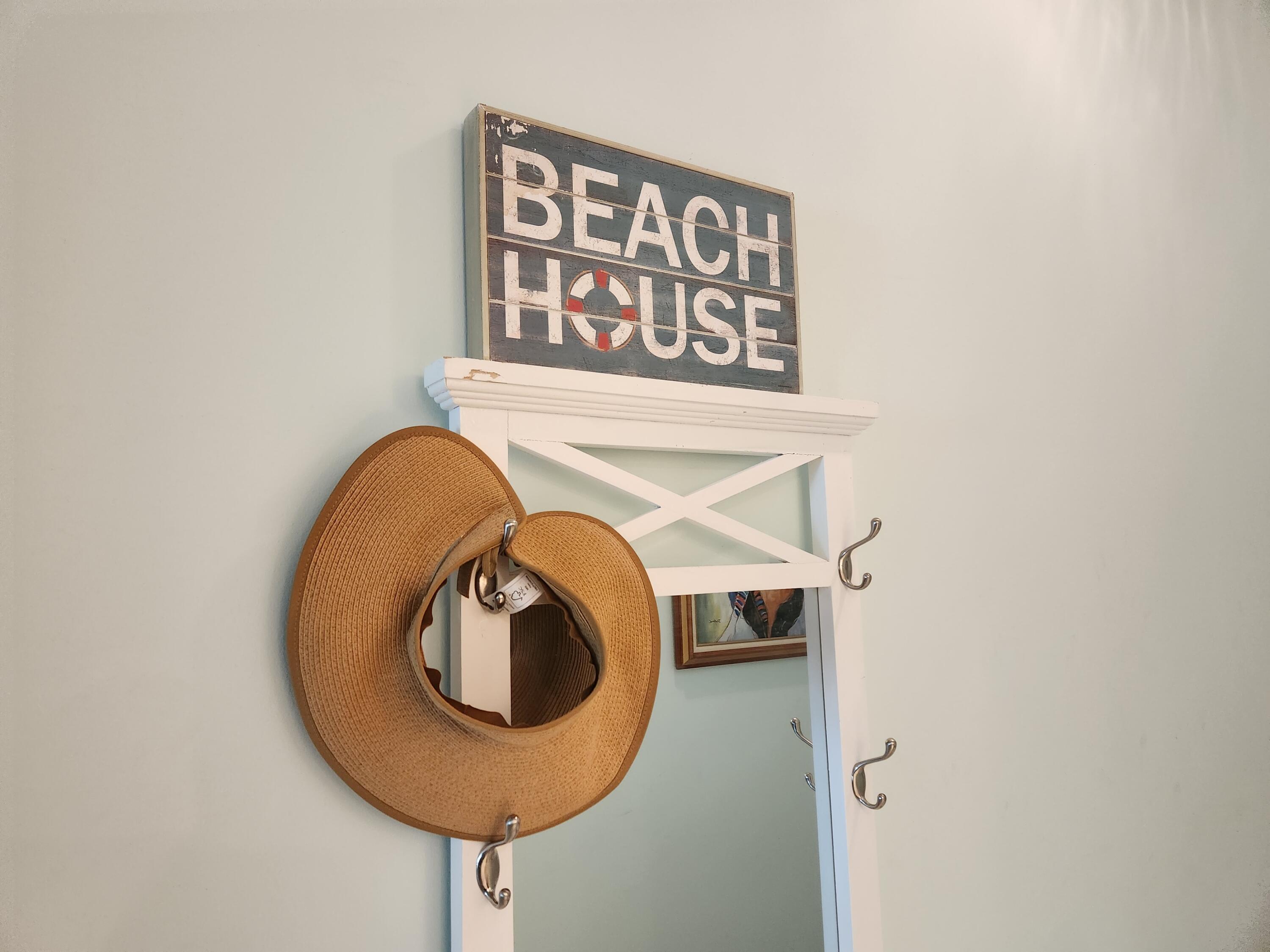 1 Harbour Isle Drive East, Unit 104 Fort Pierce, FL 34949 - Photo 28 of 28 a bathroom with a sink and a mirror