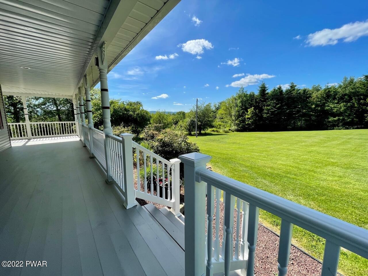 524 Creamton Drive Prompton, PA 18456 - Photo 29 of 57 a view of a deck with a big yard