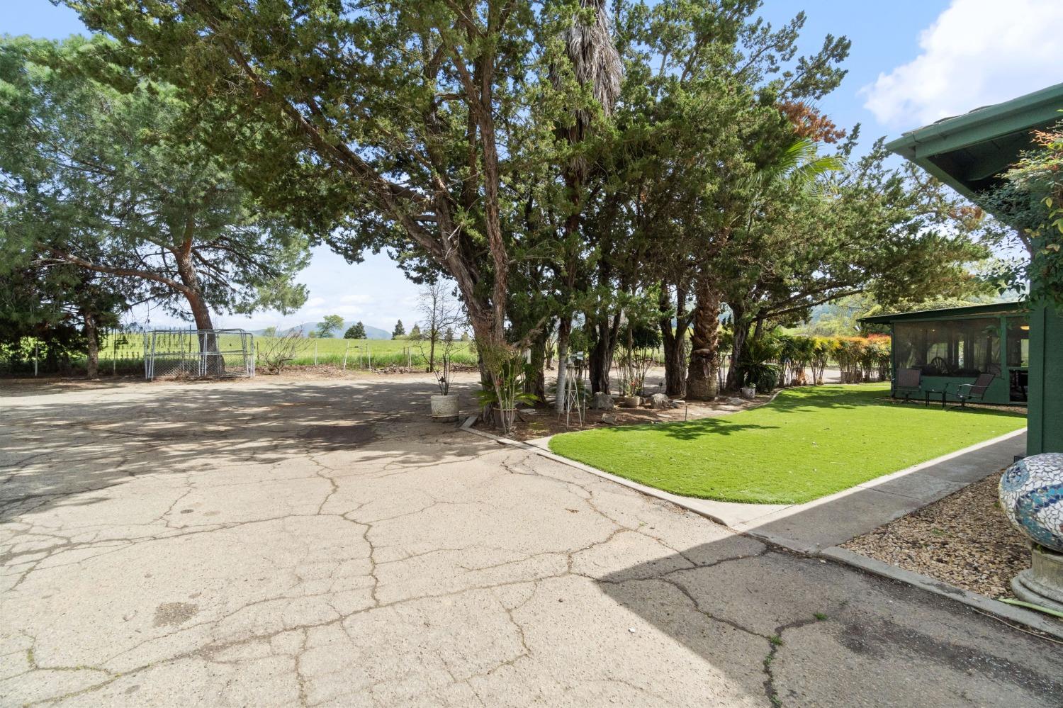 2244 Tivy Valley Road Sanger, CA 93657 - Photo 33 of 44 a view of a swimming pool with a patio