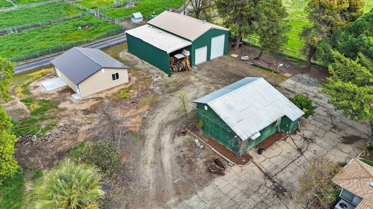 2244 Tivy Valley Road Sanger, CA 93657 - Photo 42 of 44 an aerial view of a house with a yard