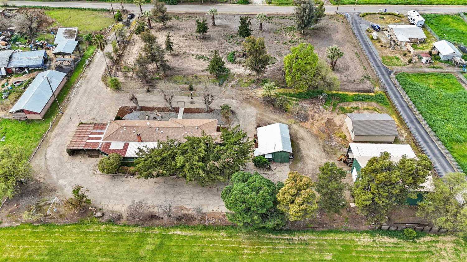 2244 Tivy Valley Road Sanger, CA 93657 - Photo 44 of 44 an aerial view of house with yard swimming pool and outdoor seating