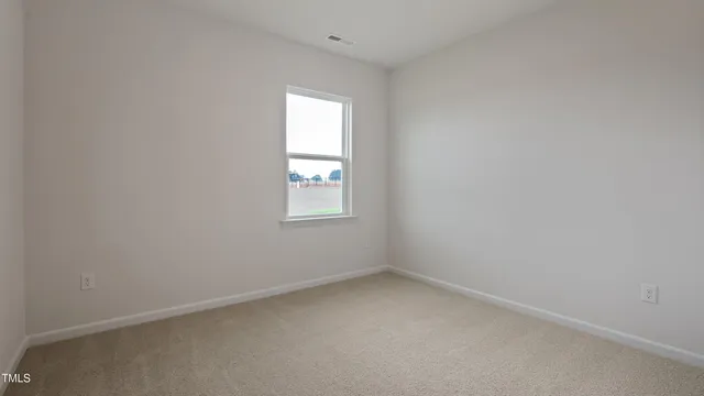 an empty room with a window