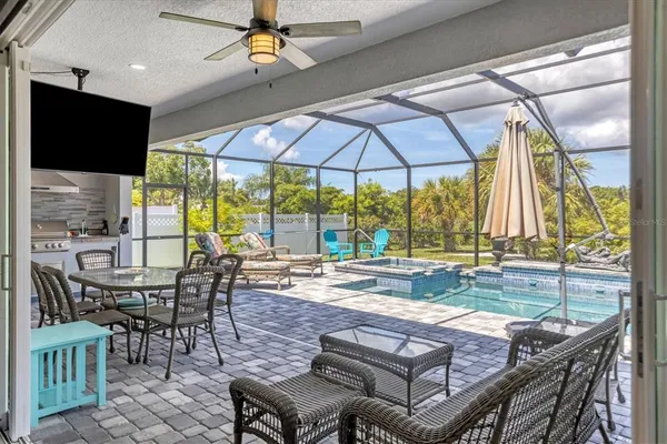 a view of a dining room with furniture window and outside view