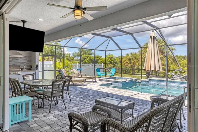 a view of a dining room with furniture window and outside view
