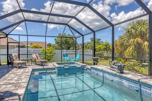 a outdoor space with the couches and dining table