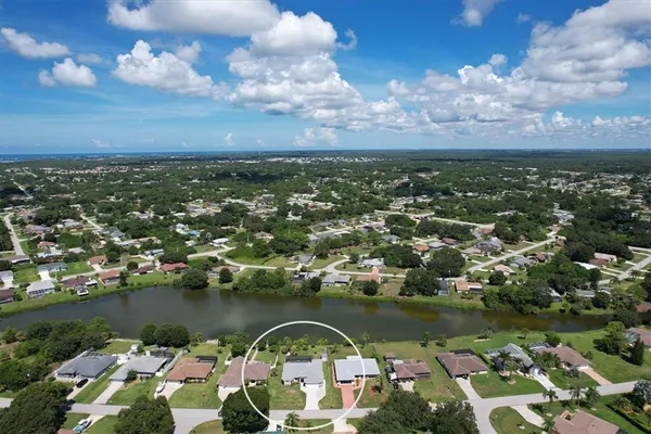 a view of a lake with a city