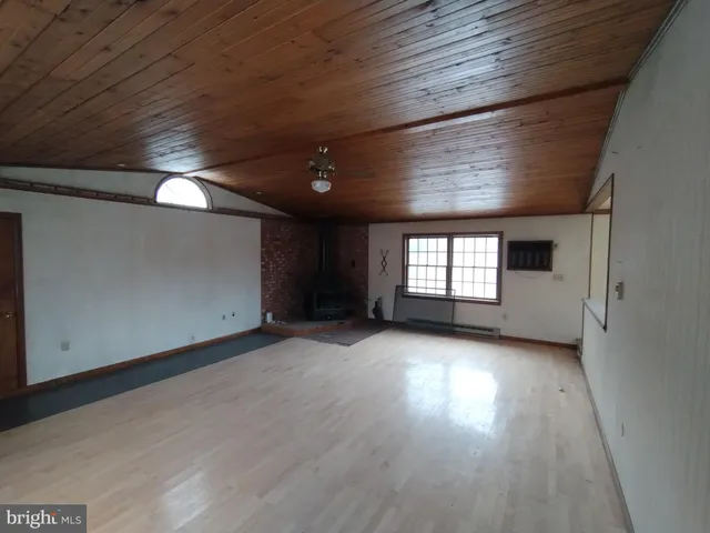 a kitchen with stainless steel appliances granite countertop a stove a sink dishwasher and a refrigerator