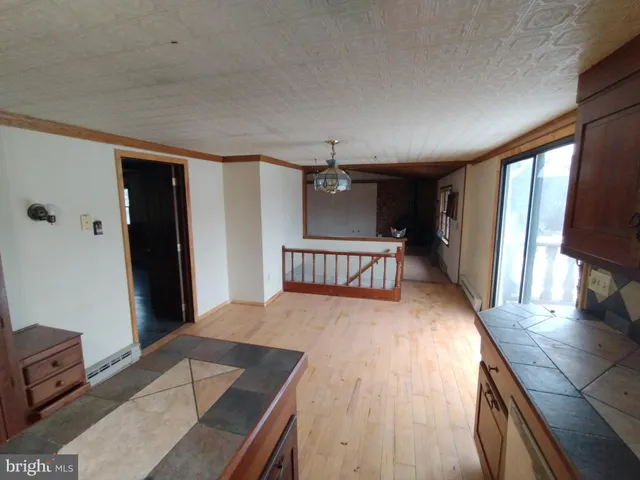 a bathroom with a bathtub and a toilet