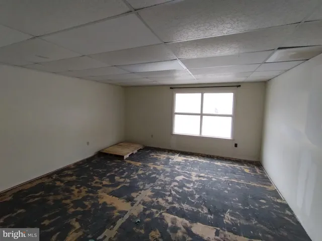 a view of hallway with livingroom