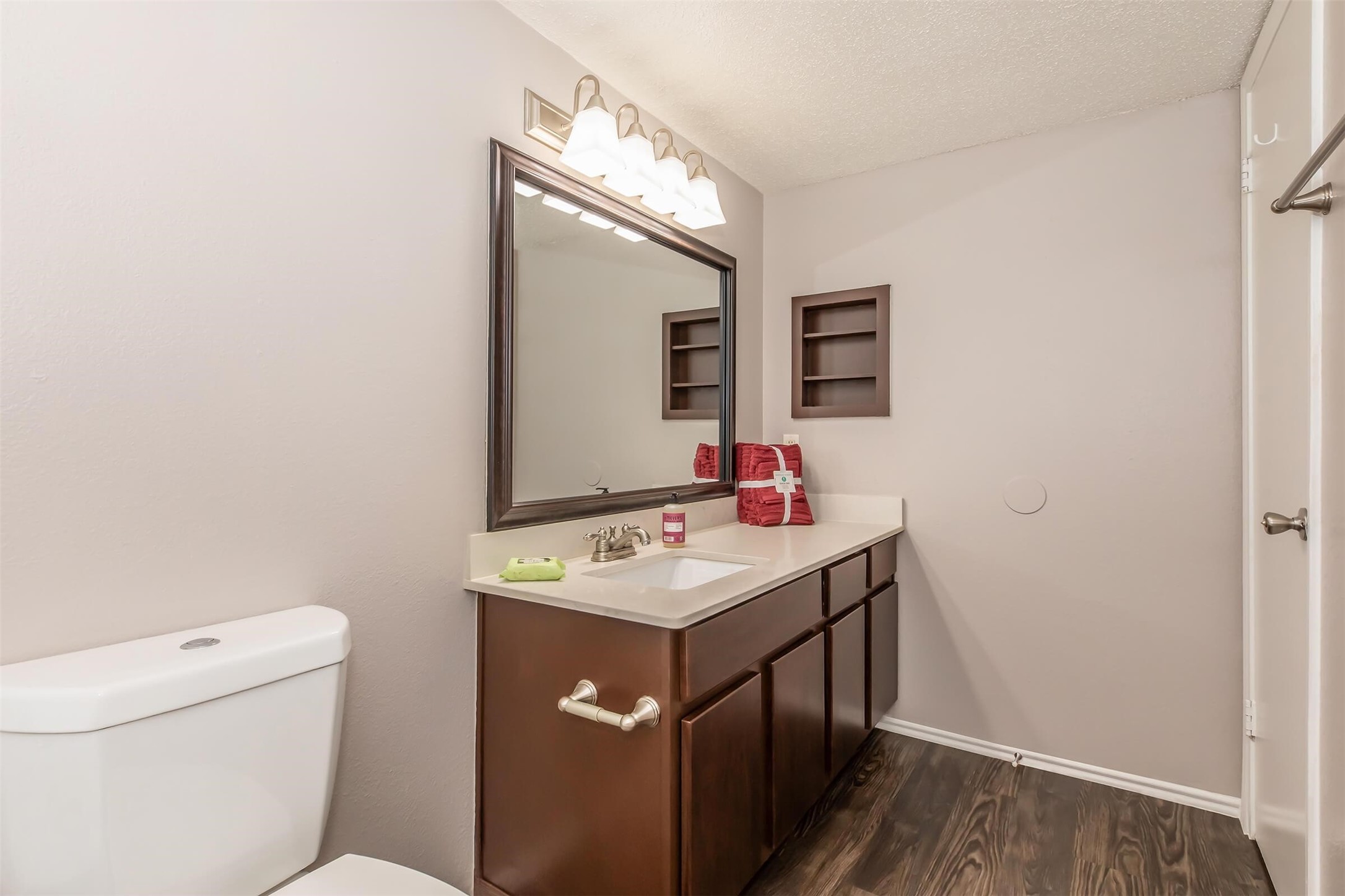 8301 Boat Club Road, Unit 1117 Fort Worth, TX 76179 - Photo 11 of 45 a bathroom with a sink and a mirror
