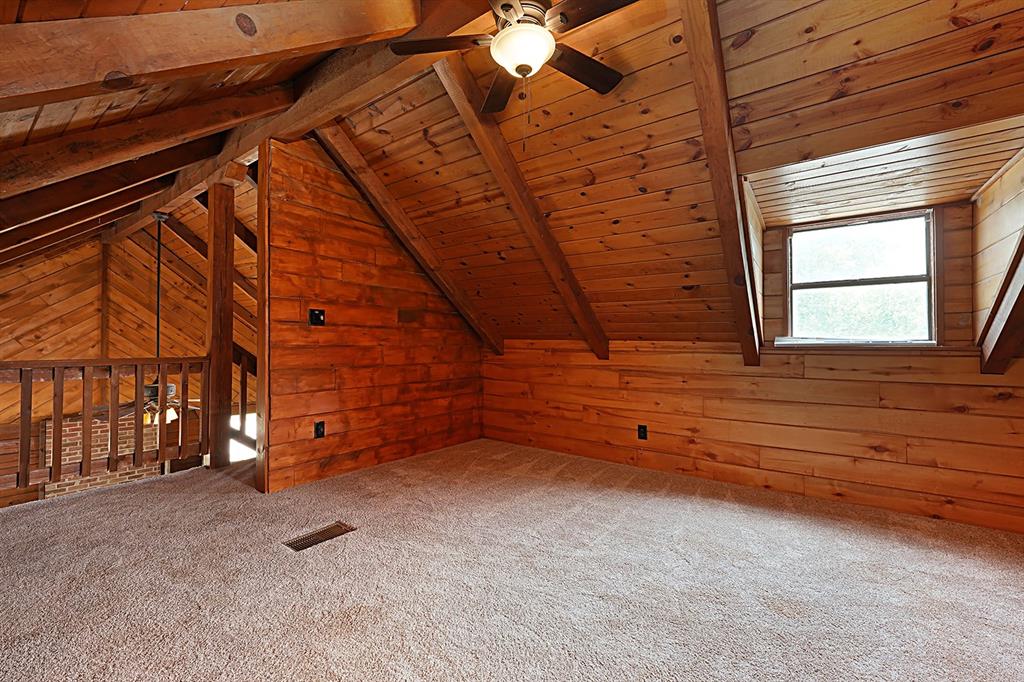 371 Spring Street Forestburg, TX 76239 - Photo 22 of 38 a view of an empty room with a fireplace