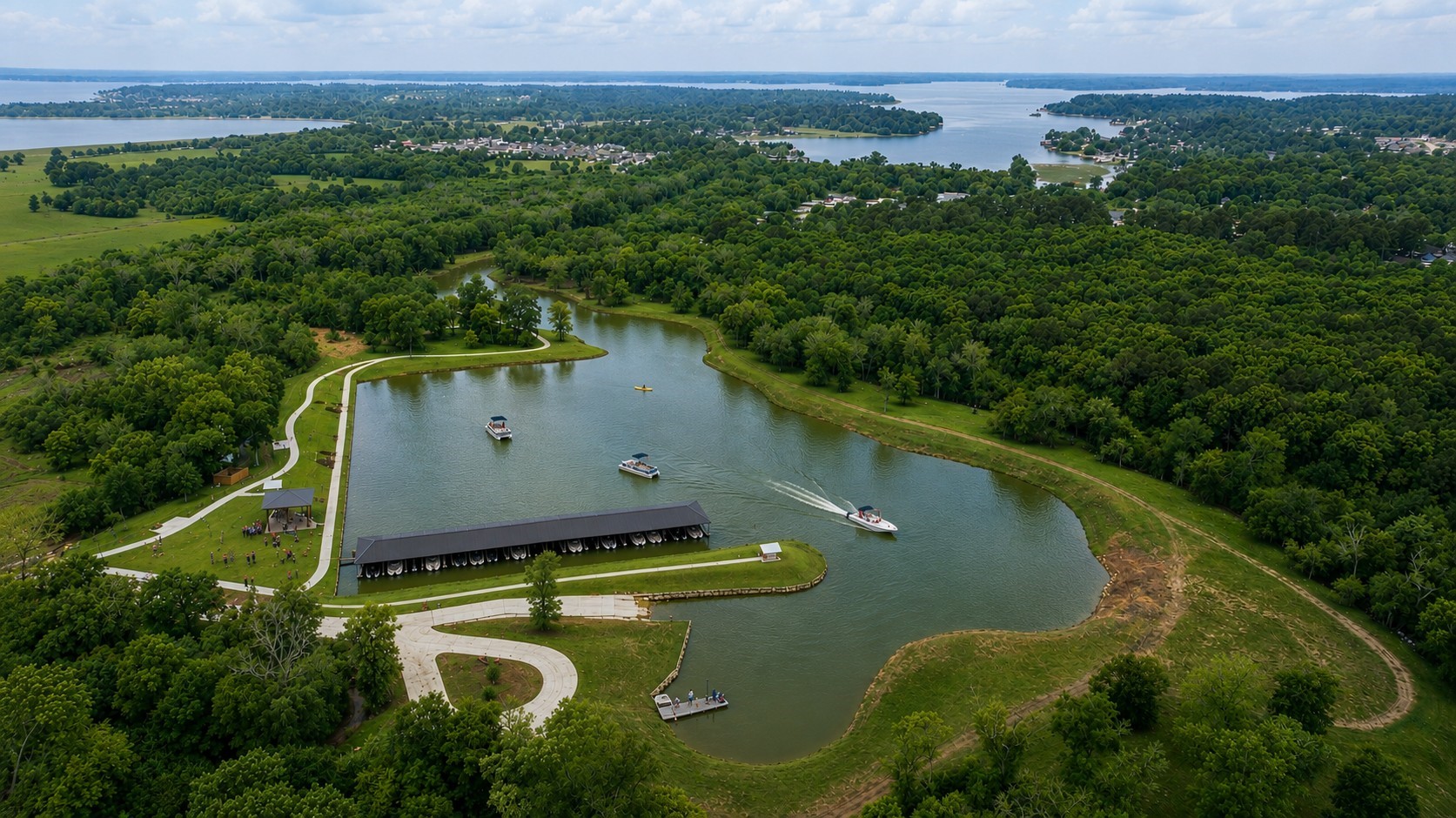 10035 Chester Rough Drive Willis, TX 77318 - Photo 8 of 9 A standout Chambers Creek amenity, the private marina and boat launch make enjoying Lake Conroe easy.