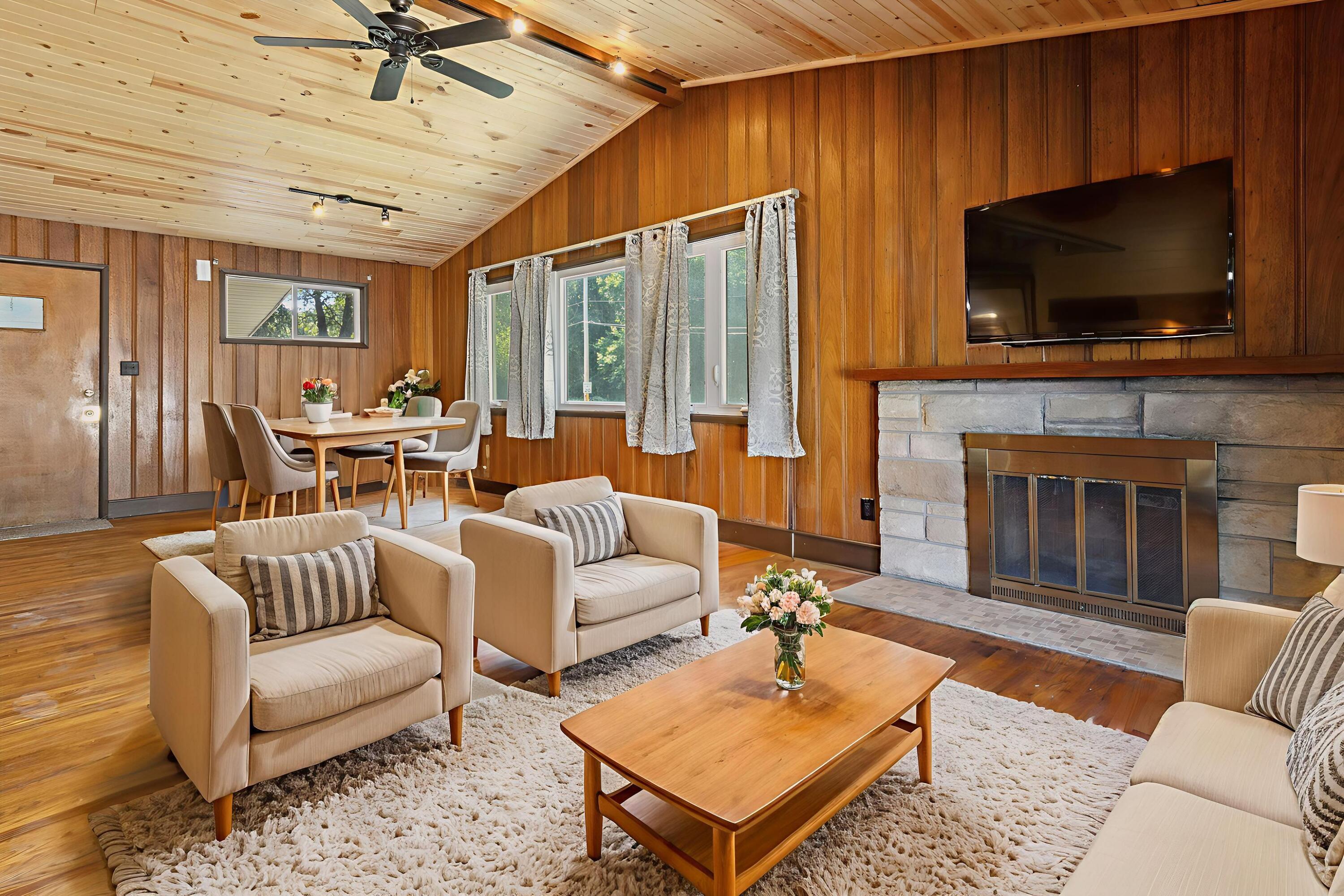 7800 Juniper Avenue Gary, IN 46403 - Photo 8 of 30 a living room with fireplace furniture and a flat screen tv