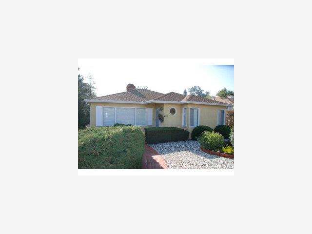 1525 Ridge Road Belmont, CA 94002 - Photo 1 of 9 a picture of a person on a street