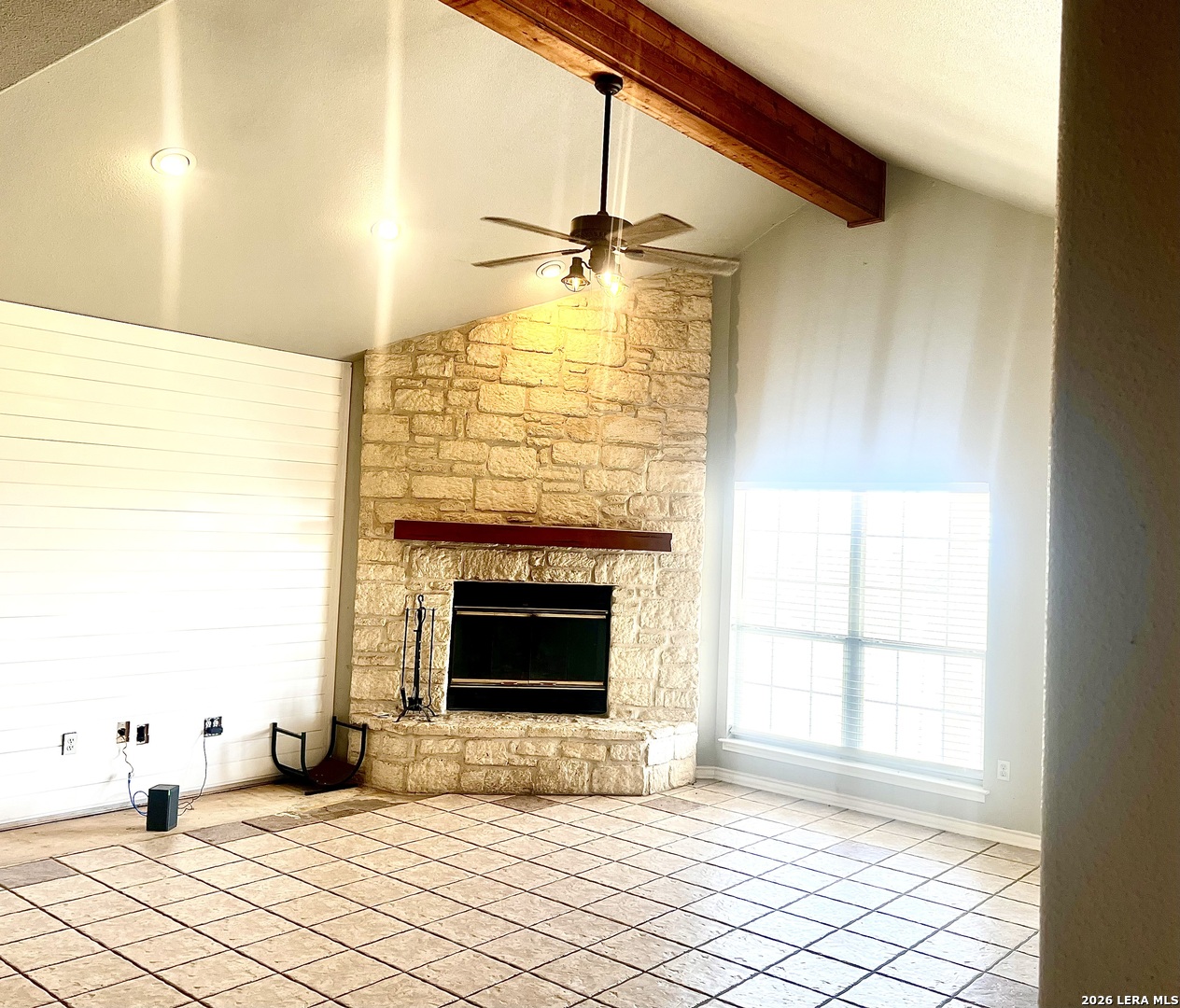 1816 Shepherds Bulverde, TX 78163 - Photo 6 of 32 a view of empty room with a fireplace and wooden floor