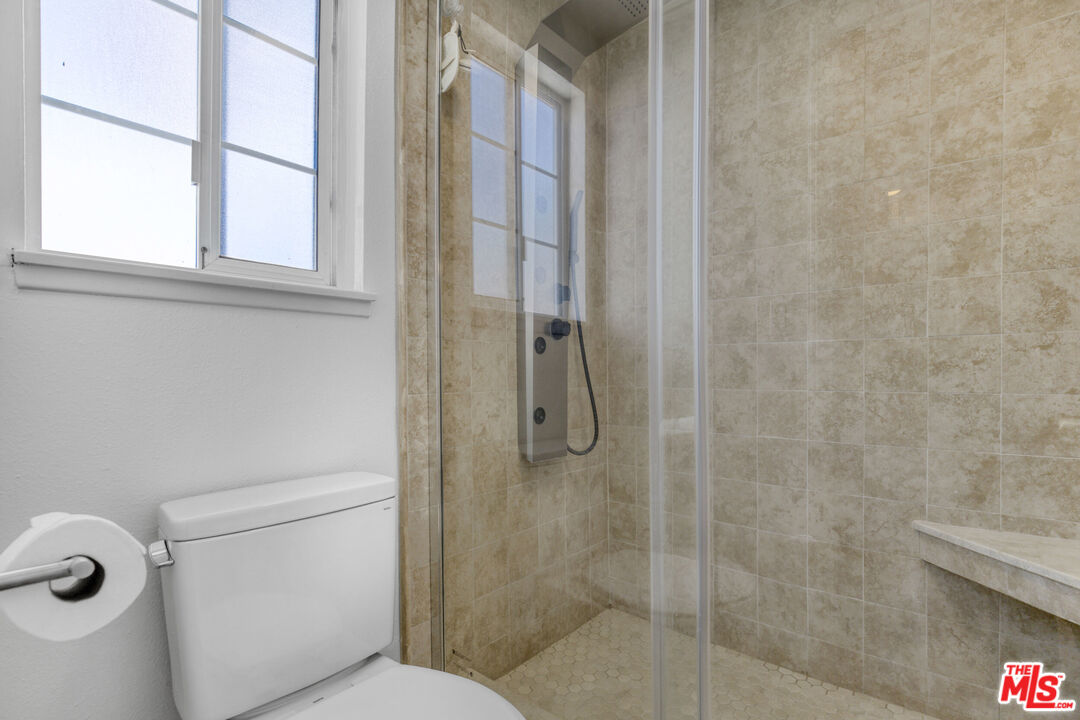 2735 Beth Place Simi Valley, CA 93065 - Photo 19 of 31 a bathroom with a shower and toilet