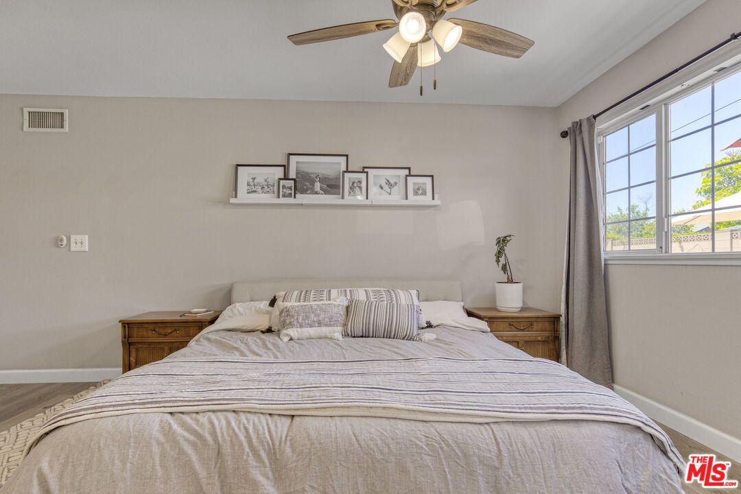 2735 Beth Place Simi Valley, CA 93065 - Photo 20 of 31 a bedroom with a bed and window