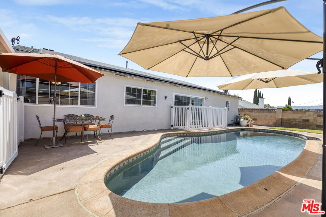 2735 Beth Place Simi Valley, CA 93065 - Photo 24 of 31 a view of a house with swimming pool and sitting area