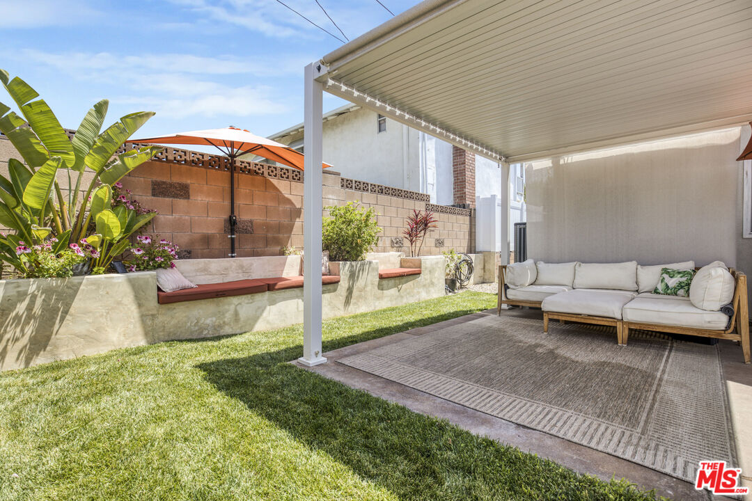2735 Beth Place Simi Valley, CA 93065 - Photo 26 of 31 a backyard of a house with table and chairs