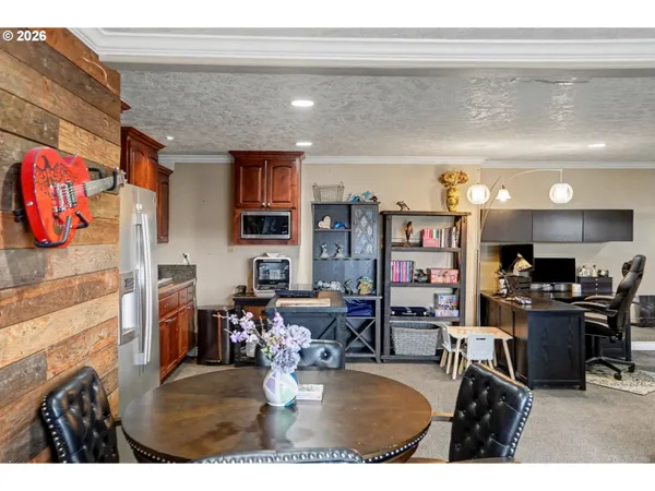 a view of a dining room with furniture