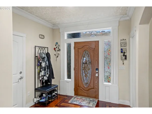 a view of a entryway with a washer and dryer