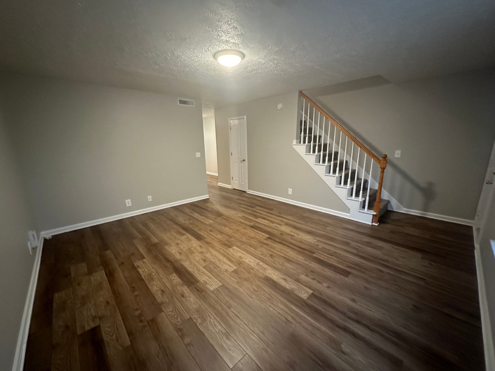 2434 Willowbrook Drive, Unit D Murfreesboro, TN 37130 - Photo 2 of 14 wooden floor in a hall with an entryway