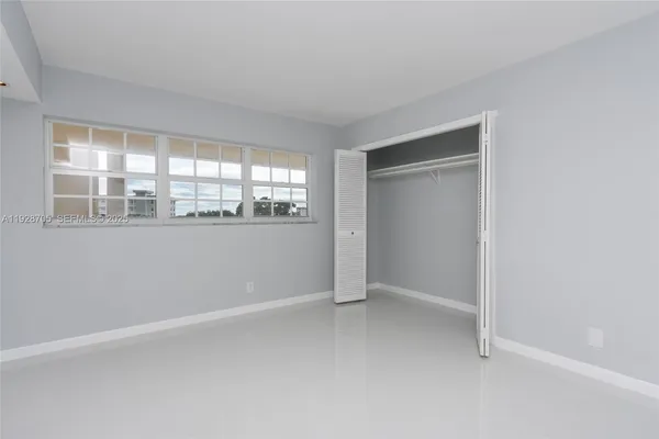 an empty room with a window