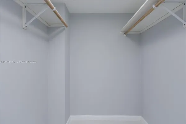 a view of small space with racks on the wall