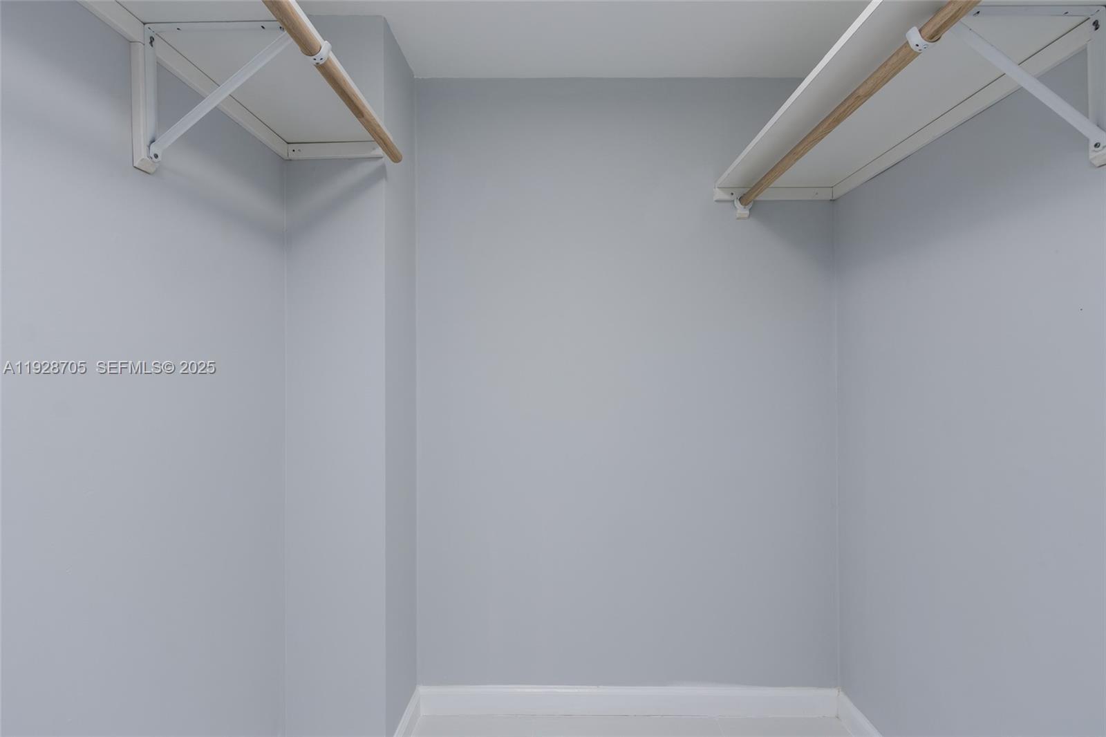 3090 North Course Drive, Unit 609 Pompano Beach, FL 33069 - Photo 19 of 36 a view of small space with racks on the wall