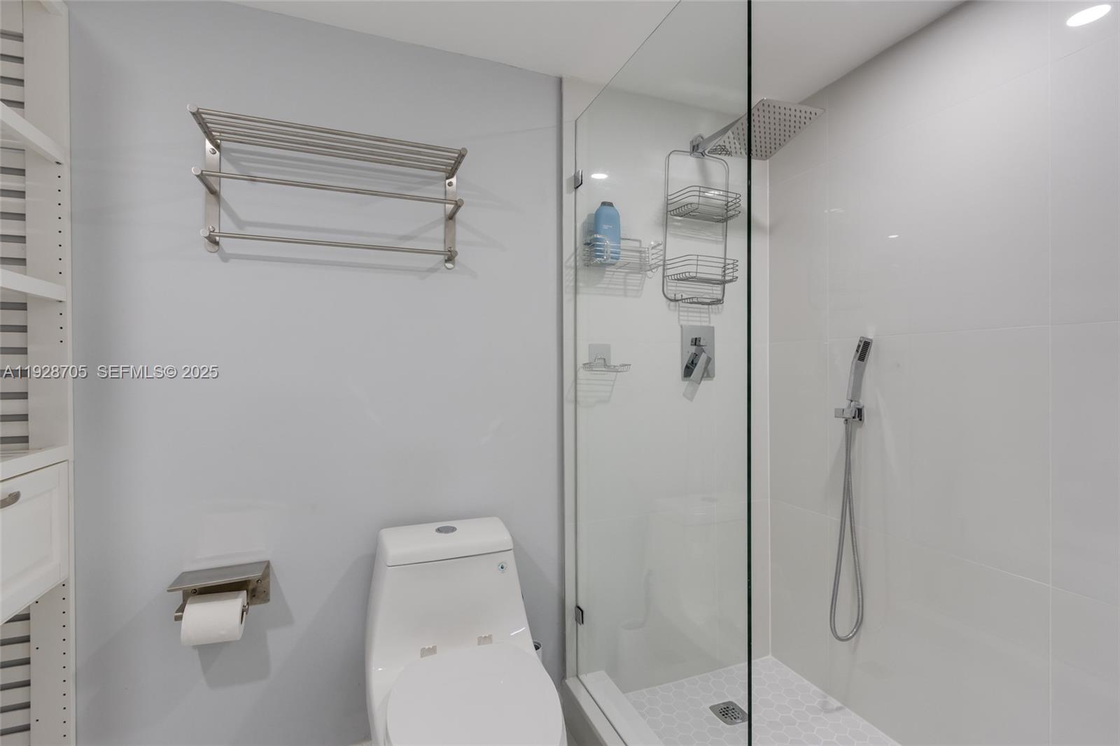 3090 North Course Drive, Unit 609 Pompano Beach, FL 33069 - Photo 20 of 36 a bathroom with a shower and toilet