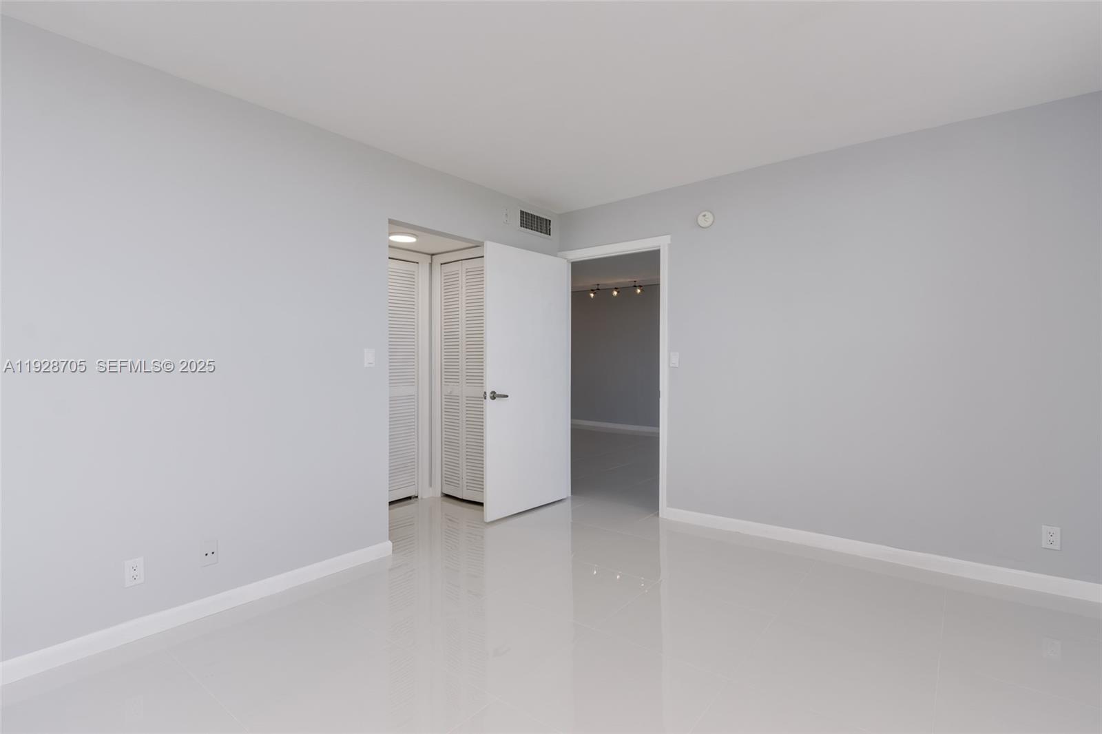 3090 North Course Drive, Unit 609 Pompano Beach, FL 33069 - Photo 24 of 36 a view of an empty room