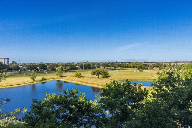 a view of a swimming pool and an ocean view