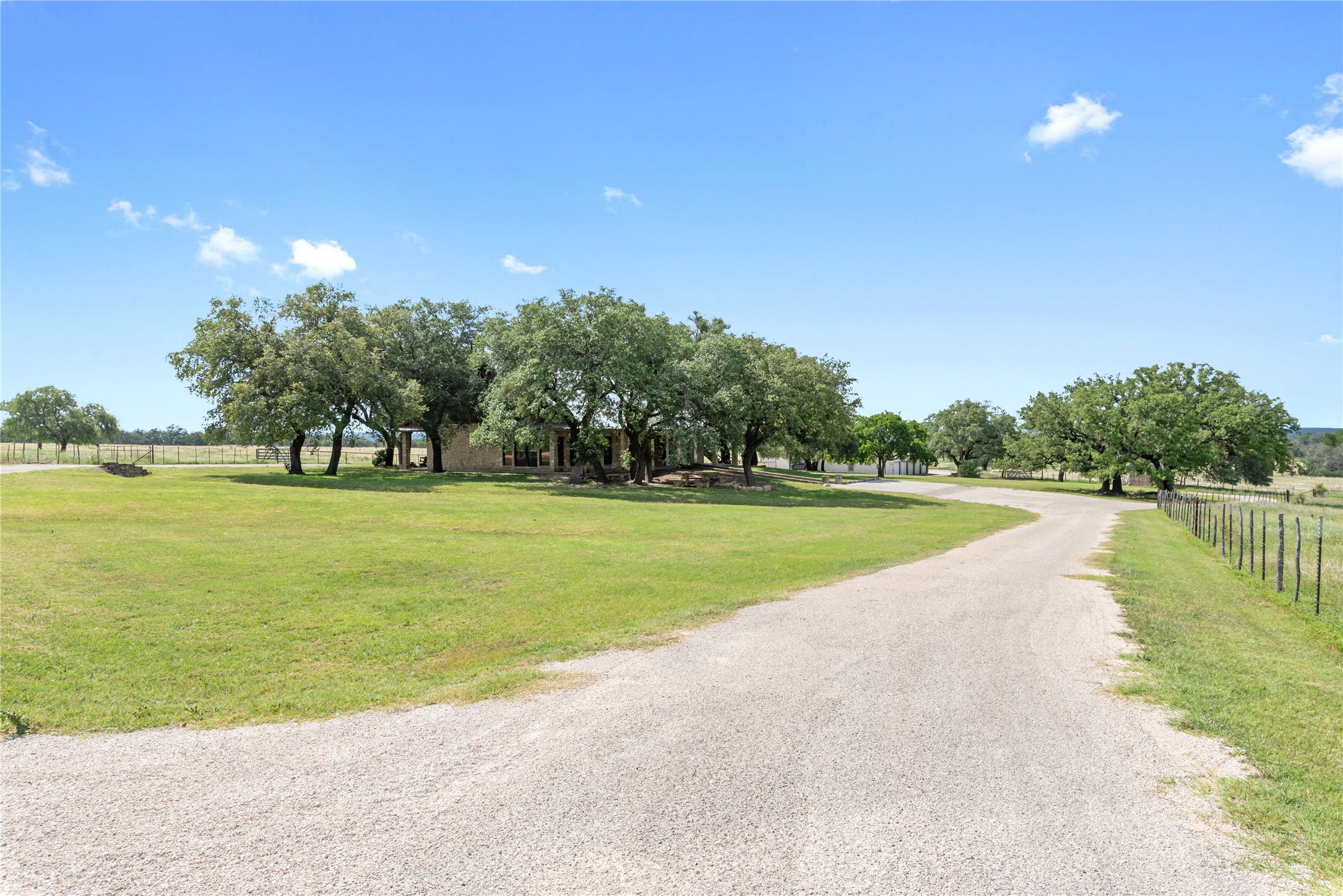 125 Hye Albert Road Hye, TX 78635 - Photo 19 of 39 View of dirt / gravel road with a view of rural / pastoral area