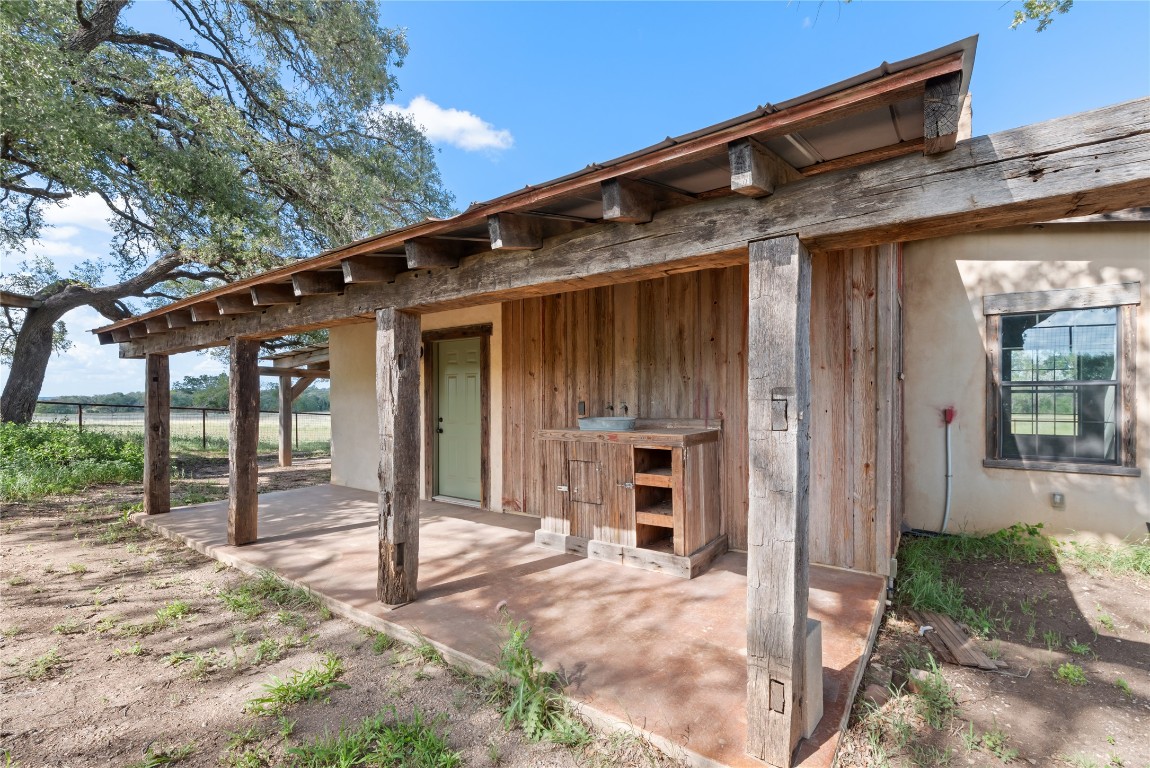 125 Hye Albert Road Hye, TX 78635 - Photo 30 of 39 a patio with table and chairs