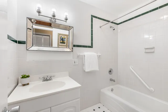 a bathroom with a sink and a bathtub