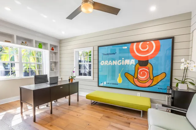 a table tennis room with furniture and window