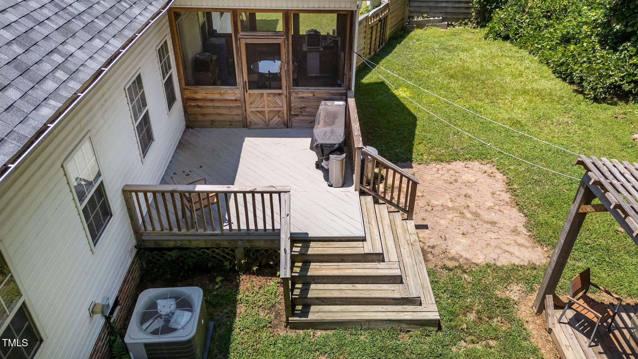 1709 Shell Cracker Drive Willow Spring, NC 27592 - Photo 18 of 28 a view of balcony with wooden floor and fence