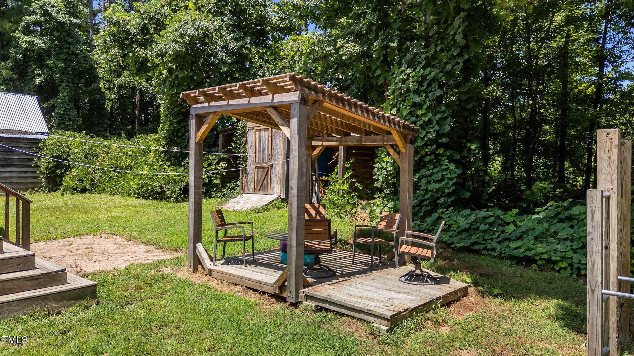1709 Shell Cracker Drive Willow Spring, NC 27592 - Photo 19 of 28 a view of a small garden