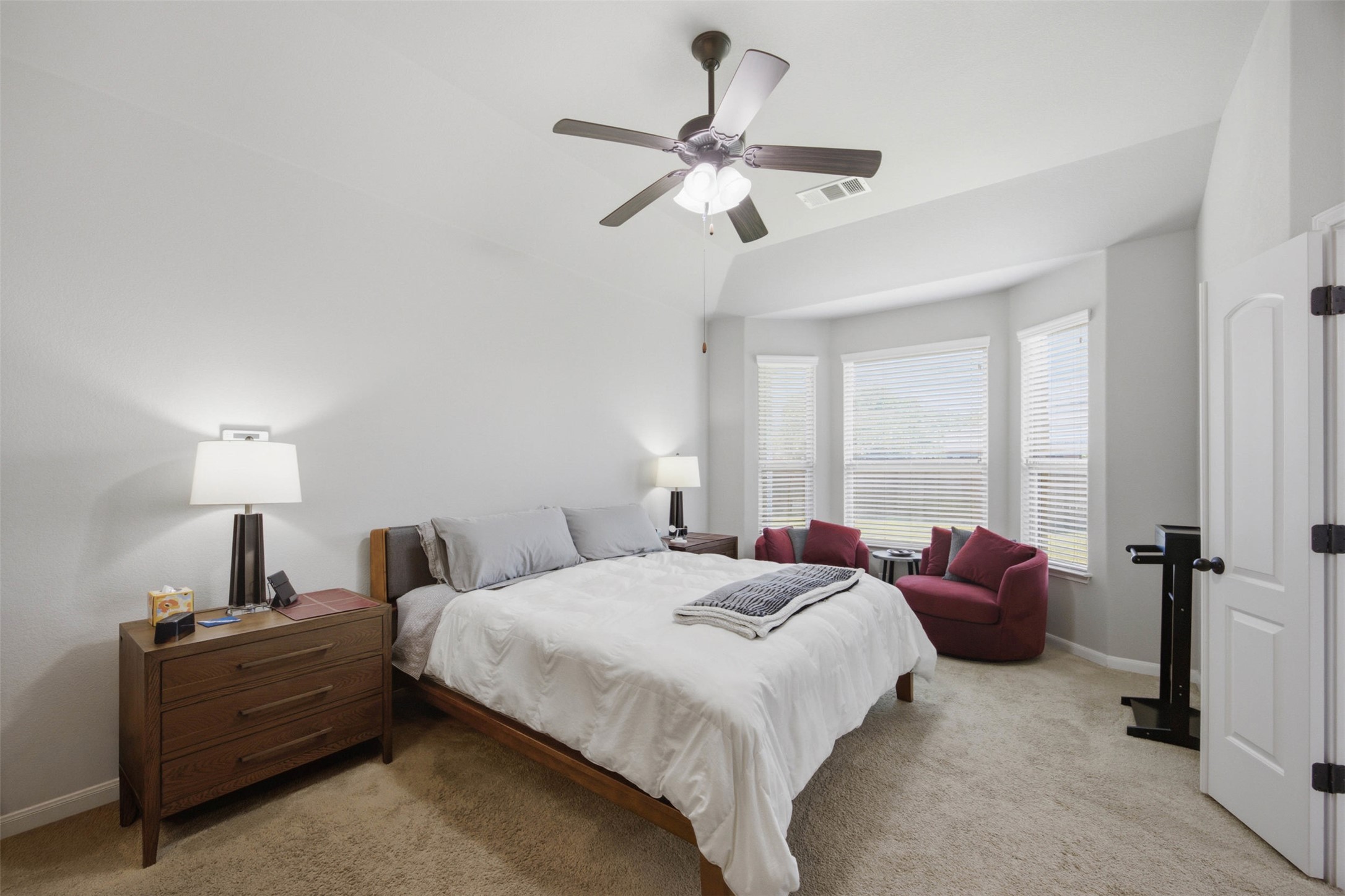 328 Rock Mill Loop Georgetown, TX 78626 - Photo 14 of 29 The main floor primary suite offers a peaceful retreat with plenty of natural light. Generous in size, it provides comfortable space to unwind at the end of the day. Its main level location adds everyday convenience.