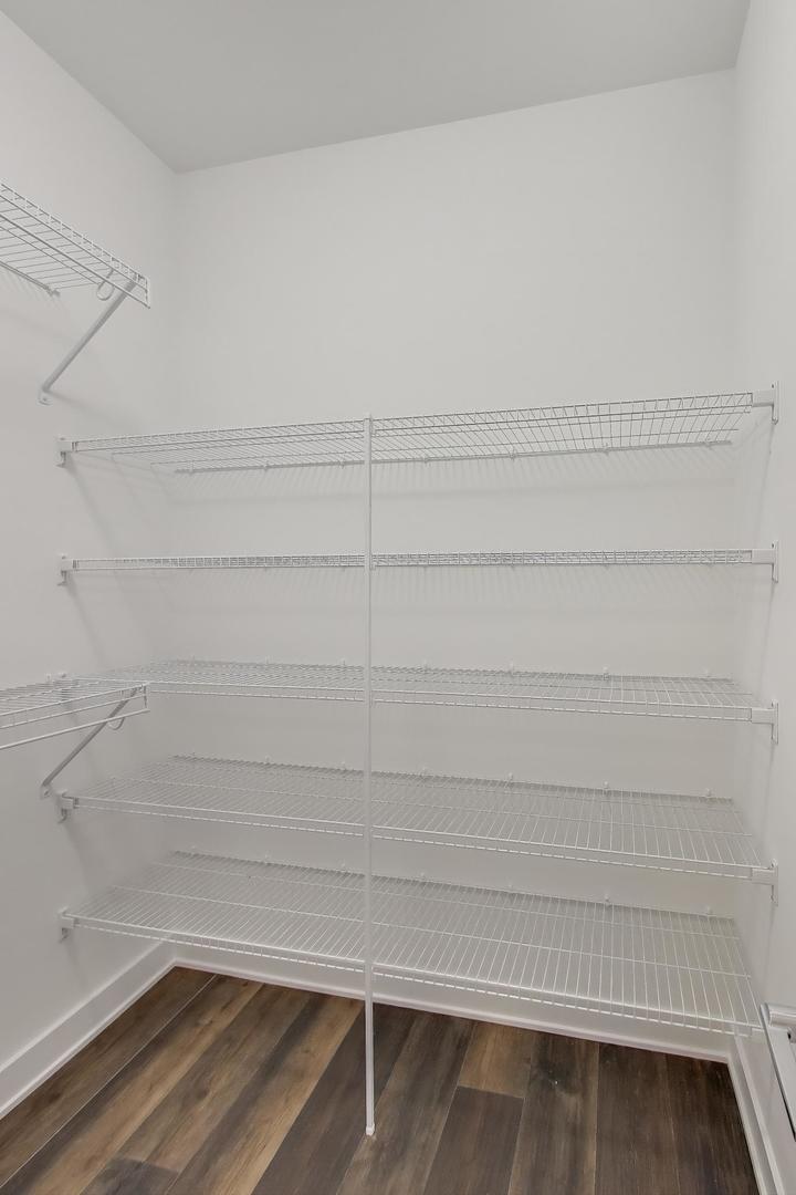 898 North Quentin Road Palatine, IL 60067 - Photo 16 of 28 a view of small space with racks on the wall