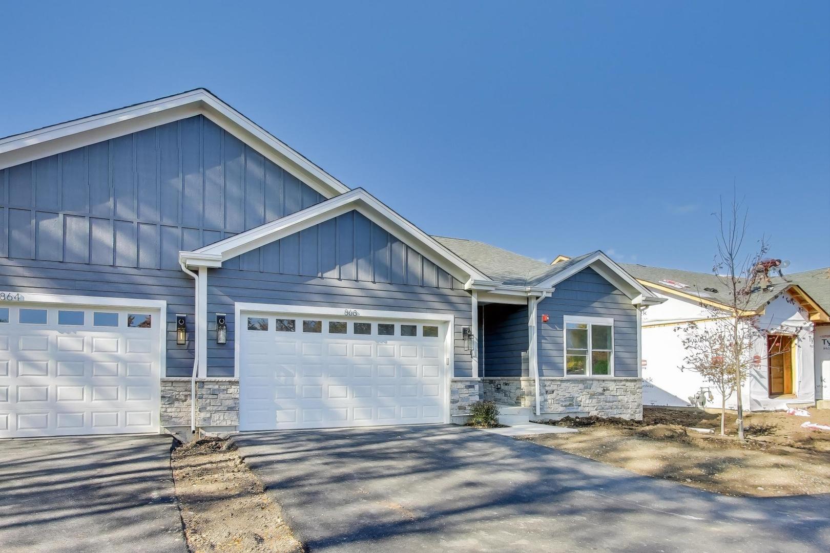 898 North Quentin Road Palatine, IL 60067 - Photo 2 of 28 a view of a house with a yard