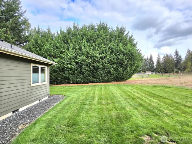 front view of a house and a yard