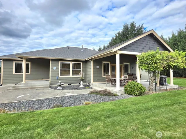 a backyard of a house with seating space