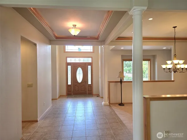 a view of a kitchen with furniture and a window