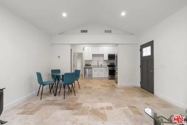a view of a dining room with furniture