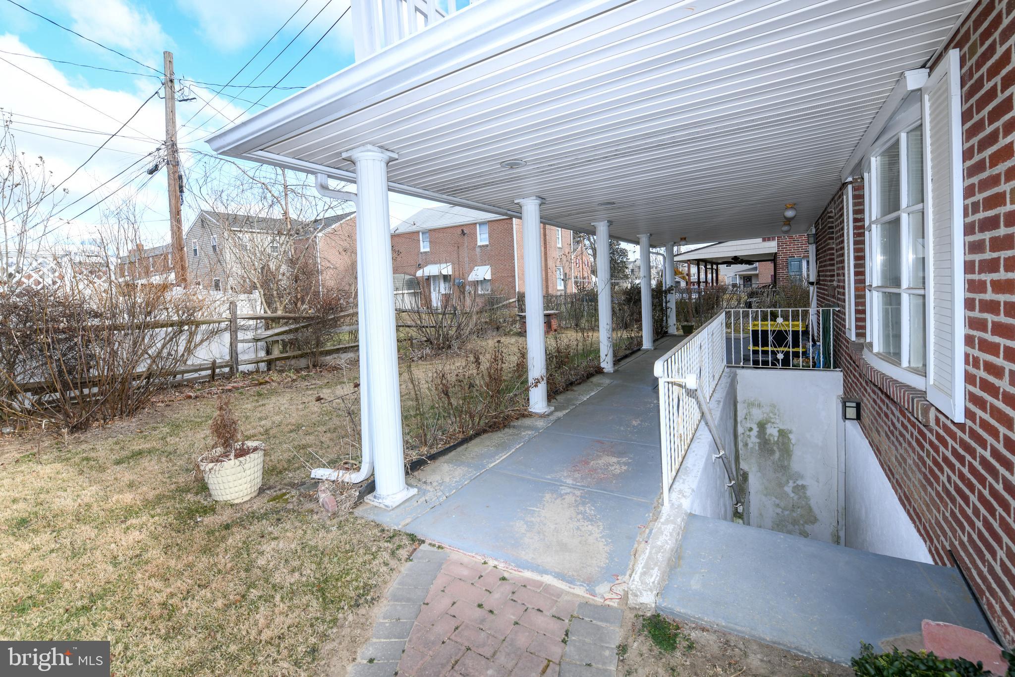 228 Mill Road Havertown, PA 19083 - Photo 39 of 43 Back Patio - view from driveway